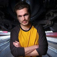 Gage Laughlin Man with dark hair, mustache and beard